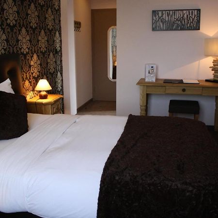 Hotel De La Gare Monthey Bagian luar foto