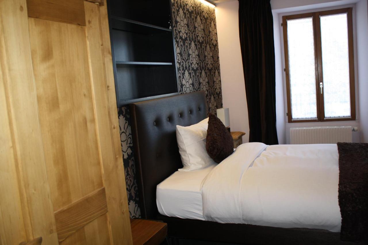 Hotel De La Gare Monthey Bagian luar foto